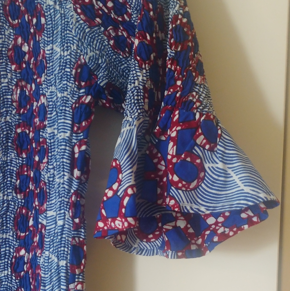 African print stretchy Dress. The 1st photo is the correct colors.